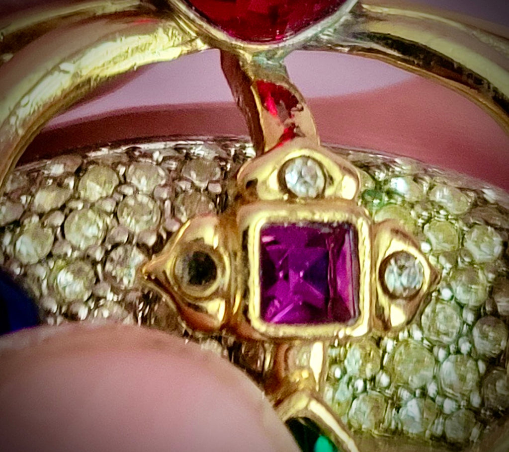 The Swarovski Regal Crown Brooch is a striking masterpiece that combines timeless elegance with meticulous craftsmanship. Designed with intricate pavé detailing and adorned with multicolored rhinestones, it radiates luxury and sophistication. Measuring ap