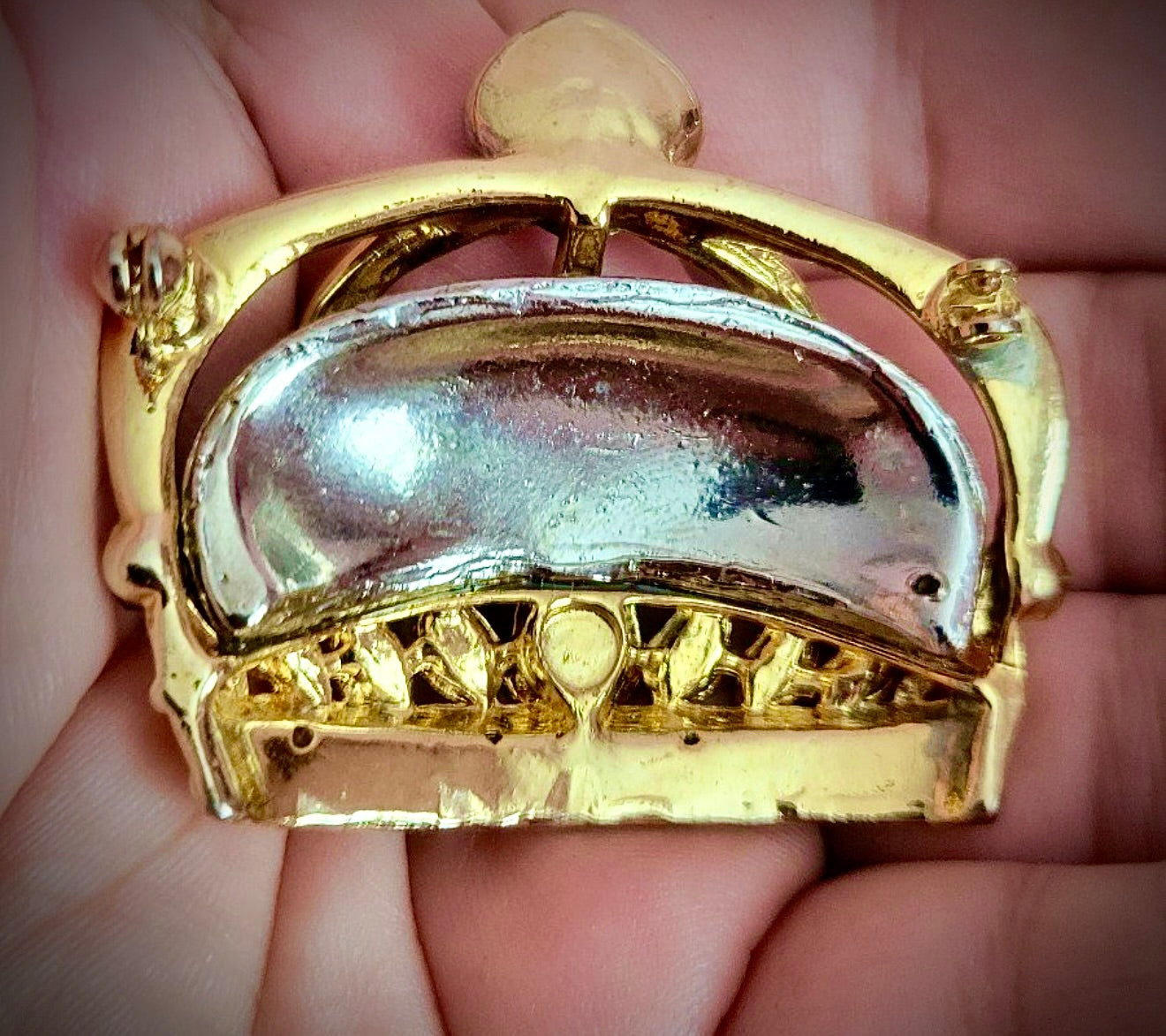 The Swarovski Regal Crown Brooch is a striking masterpiece that combines timeless elegance with meticulous craftsmanship. Designed with intricate pavé detailing and adorned with multicolored rhinestones, it radiates luxury and sophistication. Measuring ap