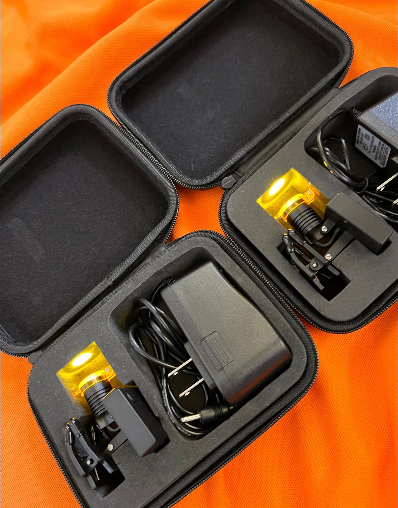 2 X Loaner Dental Loupes Wireless LED light System With Orange Filter, Charger and Carry Case Lightweight