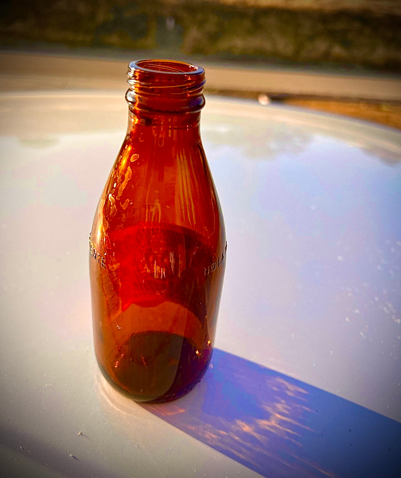 27 amber Clean empty Glass bottles for liquids, refilling, and Glass projects.