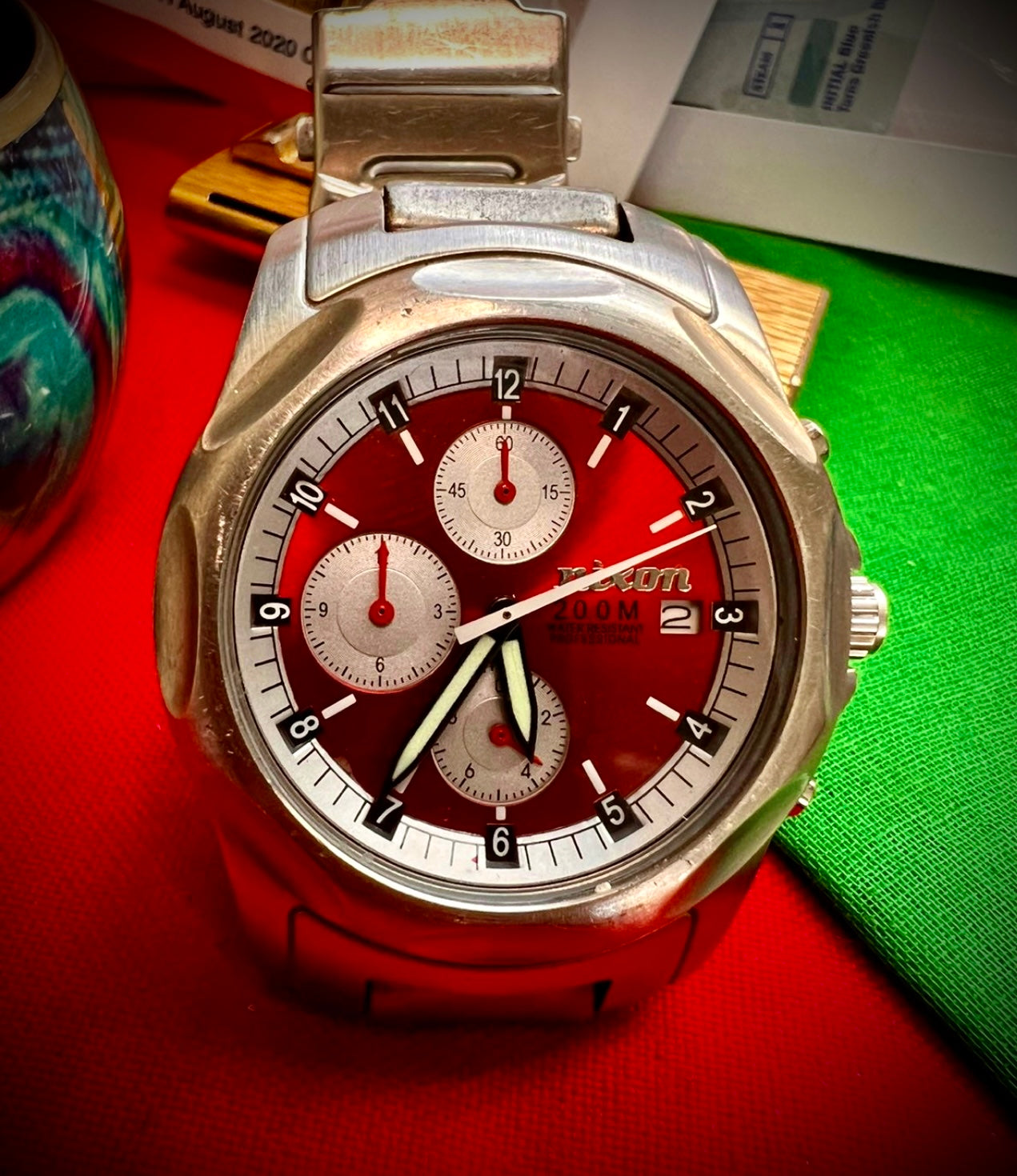 #320 Nixon Beautiful red Dial Quartz Chrinometer 200 Meter Heavy Watch With Original Bracelet