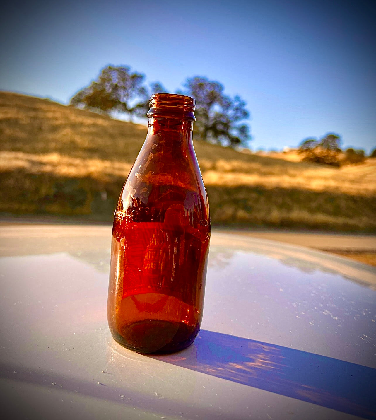 27 amber Clean empty Glass bottles for liquids, refilling, and Glass projects.