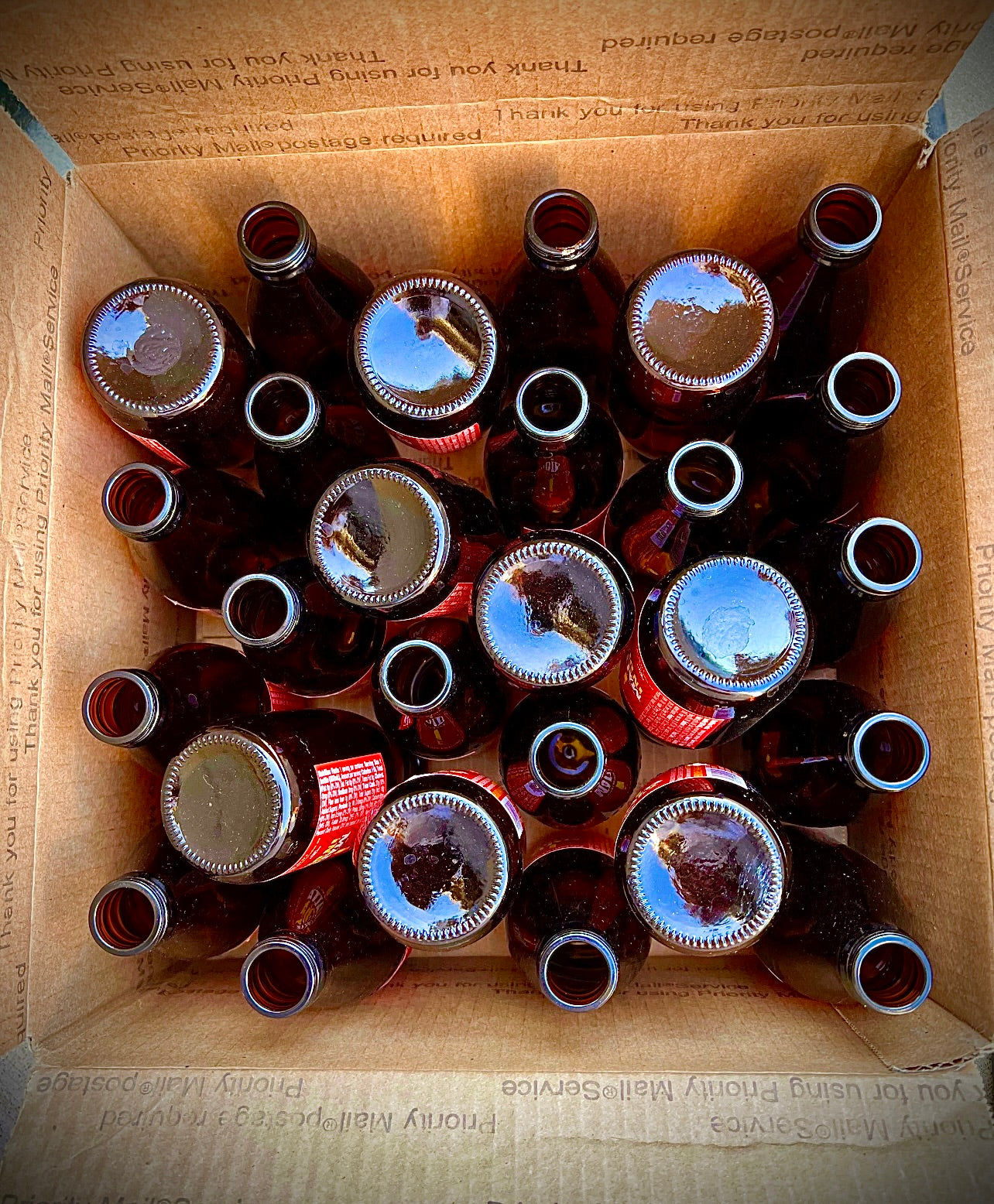 27 amber Clean empty Glass bottles for liquids, refilling, and Glass projects.